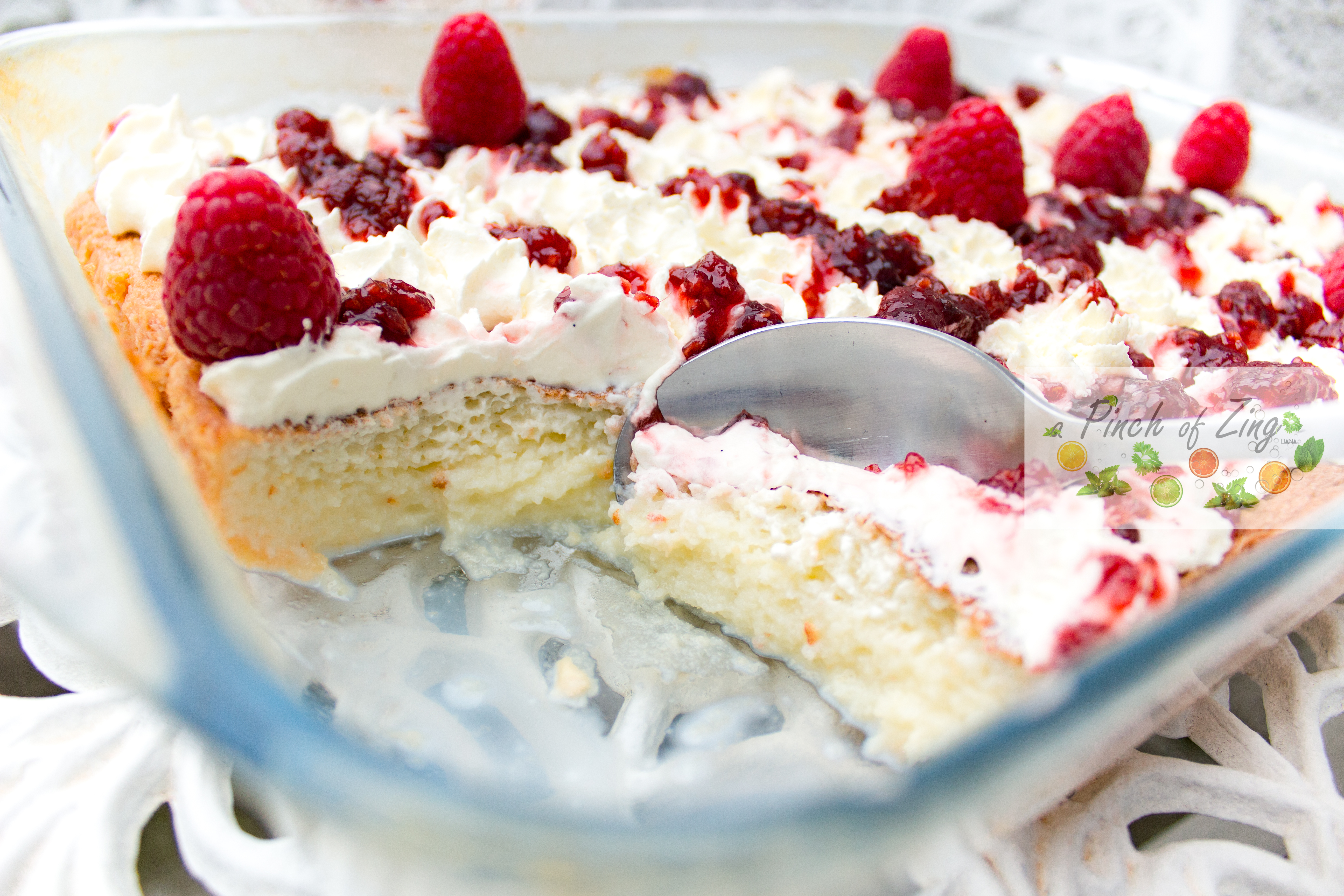 Milk cake with Chantilly cream and raspberries